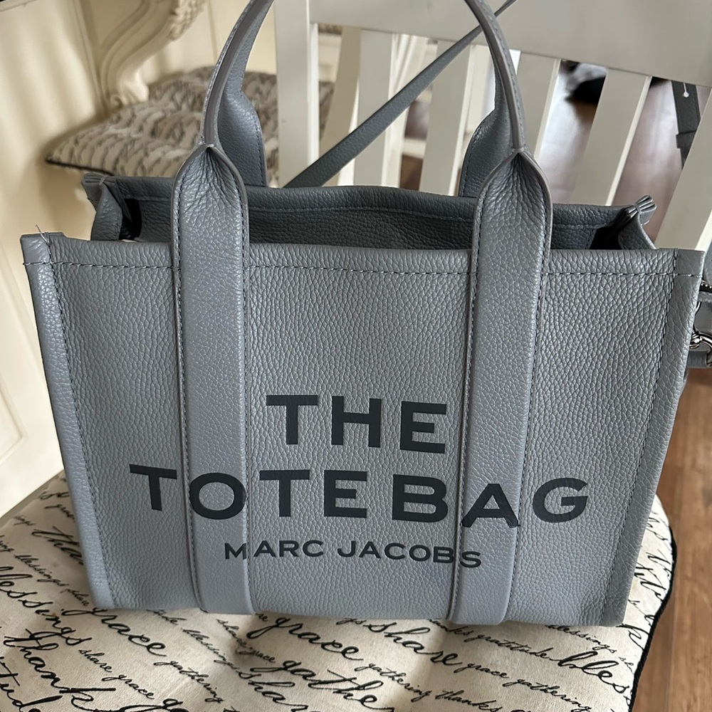 Marc Jacobs slate blue / grey color leather . The tote bag